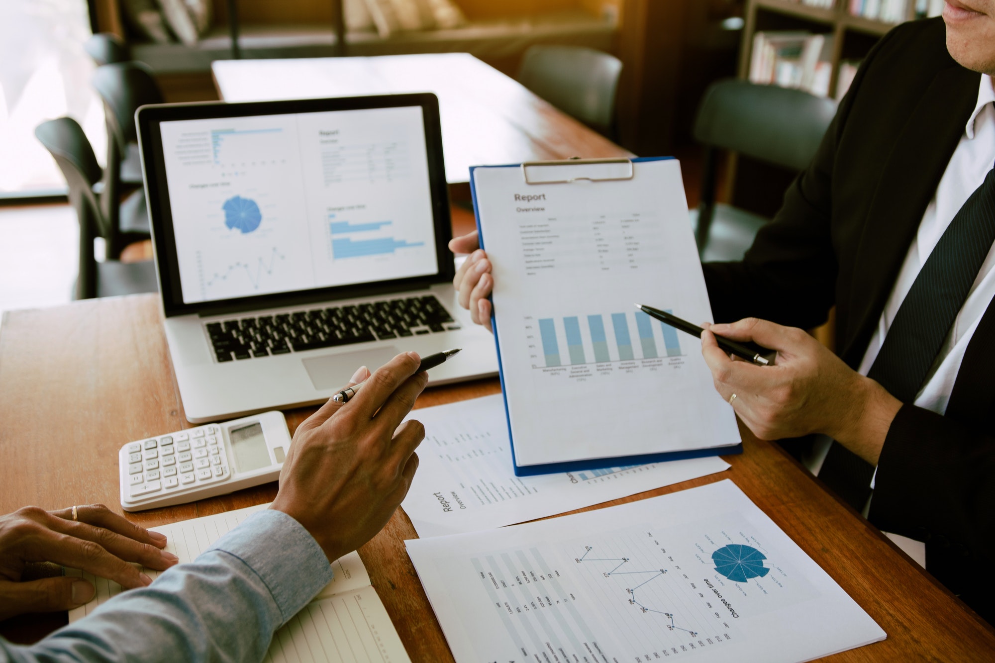 two-business-partnership-coworkers-analysis-strategy-with-discussing-a-financial-planning-graph-and.jpg two-business-partnership-coworkers-analysis-strategy-with-discussing-a-financial-planning-graph-and.jpg